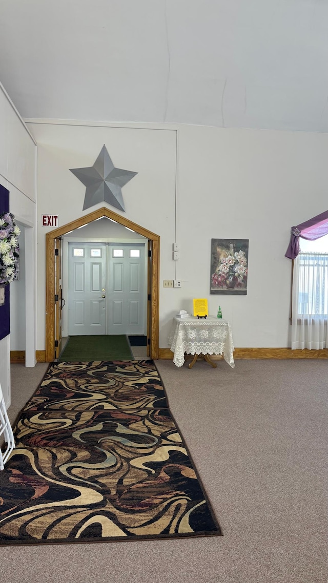 211 1st Ave, Osakis, MN 56360 - entrance foyer featuring carpet and baseboards