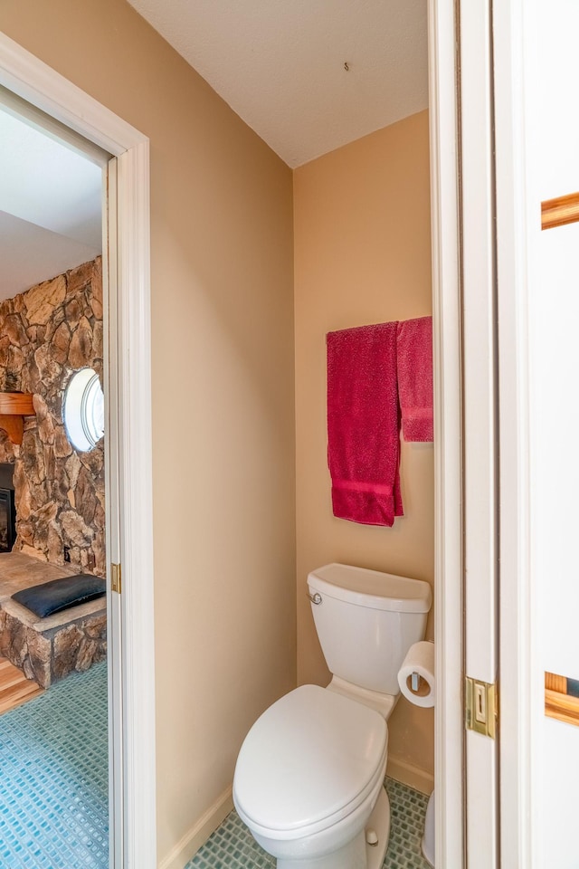 402 2nd Ave SE, Mapleton, MN 56065 - bathroom with toilet and baseboards