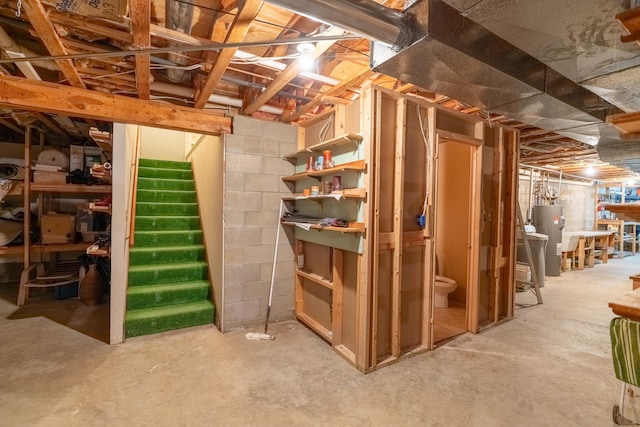 402 2nd Ave SE, Mapleton, MN 56065 - unfinished basement with stairs and water heater