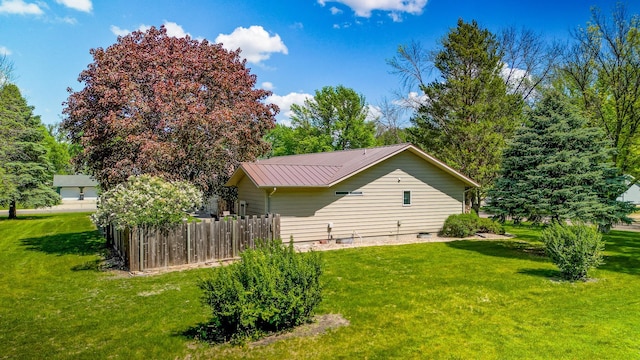 402 2nd Ave SE, Mapleton, MN 56065 - view of side of property featuring metal roof and crawl space