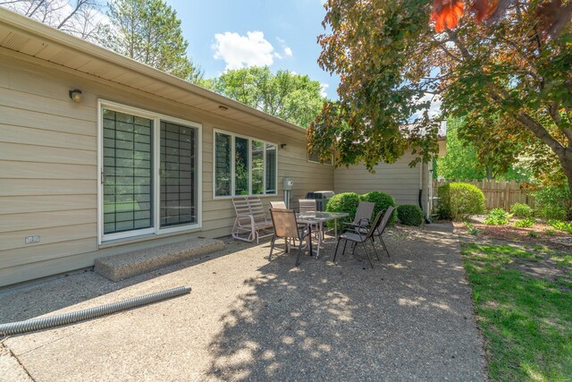 402 2nd Ave SE, Mapleton, MN 56065 - view of patio / terrace featuring fence and outdoor dining space
