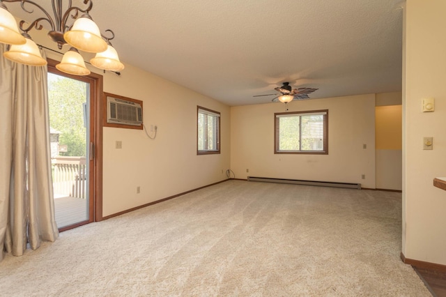 1346 Latoka Drive Ct SW, Alexandria, MN 56308 - unfurnished room featuring a baseboard heating unit, a wall unit AC, light carpet, a ceiling fan, and a textured ceiling