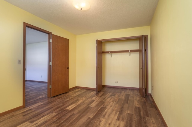 1346 Latoka Drive Ct SW, Alexandria, MN 56308 - unfurnished bedroom with wood finished floors, a closet, and a textured ceiling