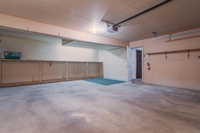 1346 Latoka Drive Ct SW, Alexandria, MN 56308 - garage featuring a garage door opener