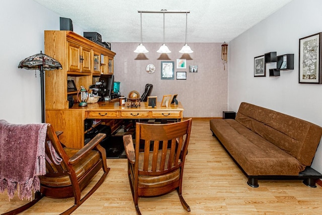 3425 100th Ave N, Moorhead, MN 56560 - office space featuring light wood finished floors, wallpapered walls, a textured ceiling, and an accent wall