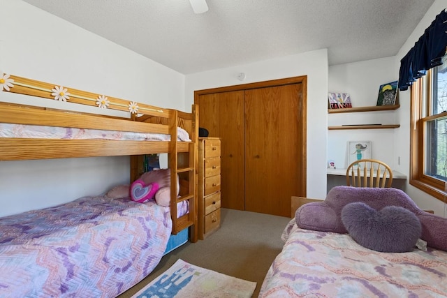 20441 Elmwood Rd, Lynden Twp, MN 55320 - bedroom with carpet, a closet, ceiling fan, and a textured ceiling