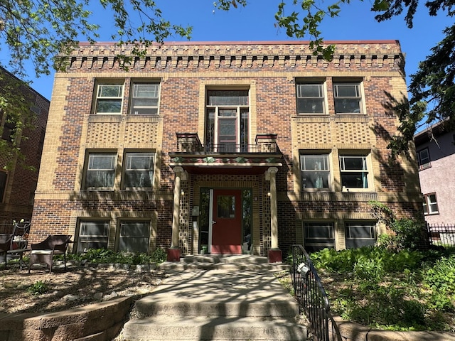 3116 12th Ave S Unit A209, Minneapolis, MN 55407 - view of front facade featuring brick siding