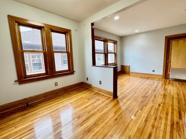 3116 12th Ave S Unit A209, Minneapolis, MN 55407 - spare room with light wood finished floors, baseboards, and recessed lighting