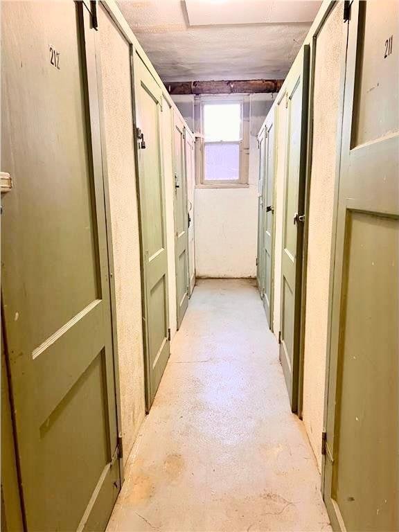 3116 12th Ave S Unit A209, Minneapolis, MN 55407 - corridor featuring concrete floors