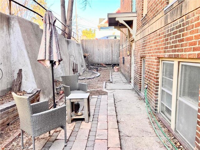 3116 12th Ave S Unit A209, Minneapolis, MN 55407 - view of patio / terrace featuring fence
