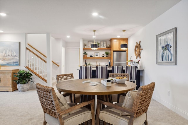 4549 Tovero Trl, Medina, MN 55340 - carpeted dining area with recessed lighting, stairs, and baseboards
