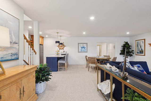 4549 Tovero Trl, Medina, MN 55340 - living area with stairway, light carpet, and recessed lighting