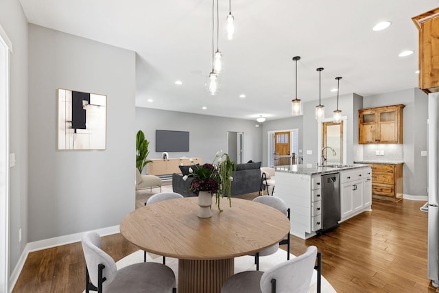 18041 224th Ave NW, Big Lake Twp, MN 55309 - dining area with recessed lighting, dark wood-style flooring, and baseboards