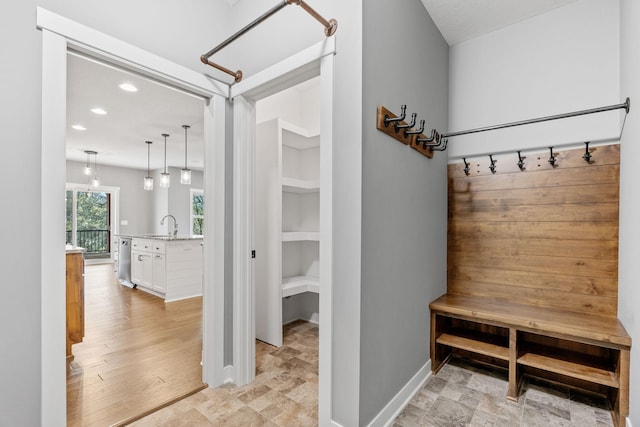 18041 224th Ave NW, Big Lake Twp, MN 55309 - mudroom with recessed lighting, a sink, and baseboards