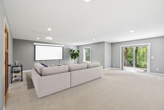 18041 224th Ave NW, Big Lake Twp, MN 55309 - cinema room featuring recessed lighting, light carpet, baseboards, and healthy amount of natural light