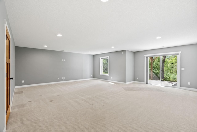 18041 224th Ave NW, Big Lake Twp, MN 55309 - empty room featuring recessed lighting, light carpet, and baseboards