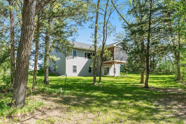 18041 224th Ave NW, Big Lake Twp, MN 55309 - view of green lawn featuring a sunroom