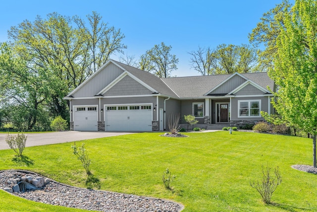 18041 224th Ave NW, Big Lake Twp, MN 55309 - craftsman-style house featuring stone siding, an attached garage, asphalt driveway, and a front lawn