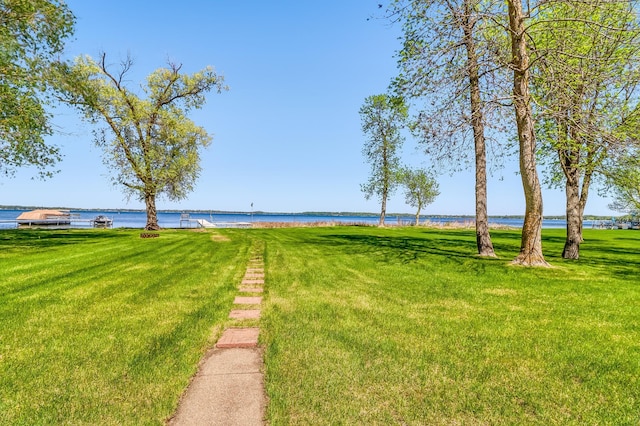 23620 Melissa Dr, Lake View Twp, MN 56501 - view of green lawn featuring a water view