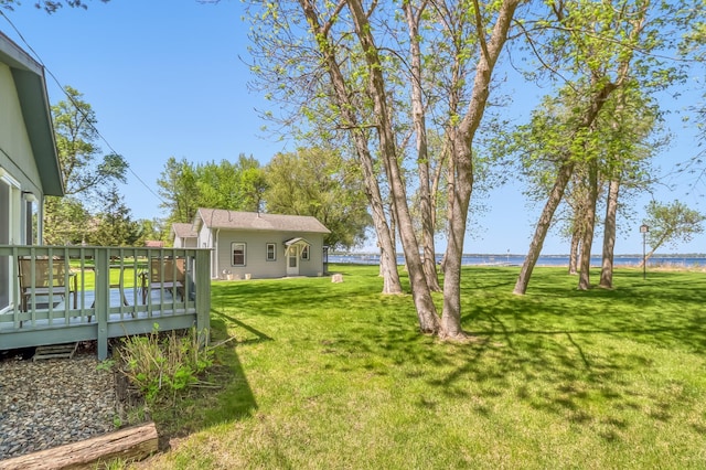 23620 Melissa Dr, Lake View Twp, MN 56501 - view of grassy yard featuring a deck with water view