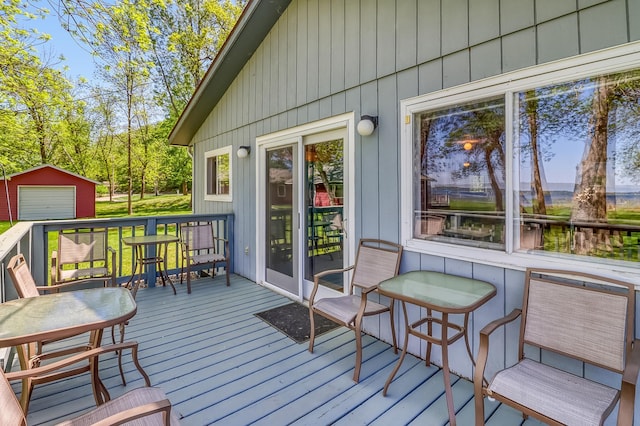 23620 Melissa Dr, Lake View Twp, MN 56501 - wooden deck featuring an outbuilding