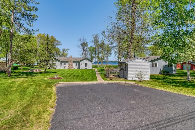 23620 Melissa Dr, Lake View Twp, MN 56501 - single story home featuring a front lawn and a chimney