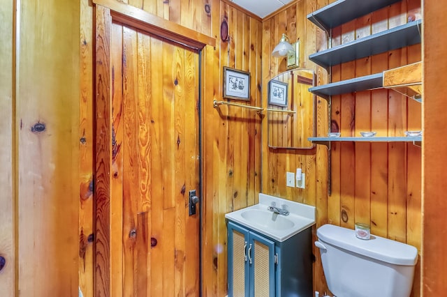 23620 Melissa Dr, Lake View Twp, MN 56501 - half bath with wood walls, toilet, and vanity