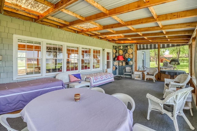 23620 Melissa Dr, Lake View Twp, MN 56501 - sunroom with healthy amount of natural light and outdoor dining space