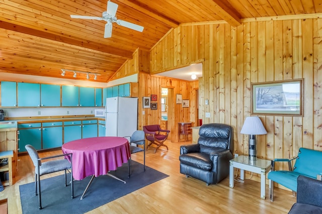 23620 Melissa Dr, Lake View Twp, MN 56501 - dining room featuring wooden ceiling, wooden walls, light wood finished floors, and ceiling fan