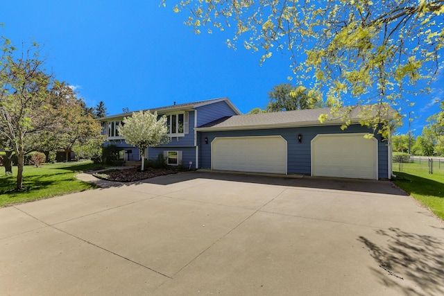5391 Cottage Ave, White Bear Twp, MN 55110 - split level home featuring a garage and driveway