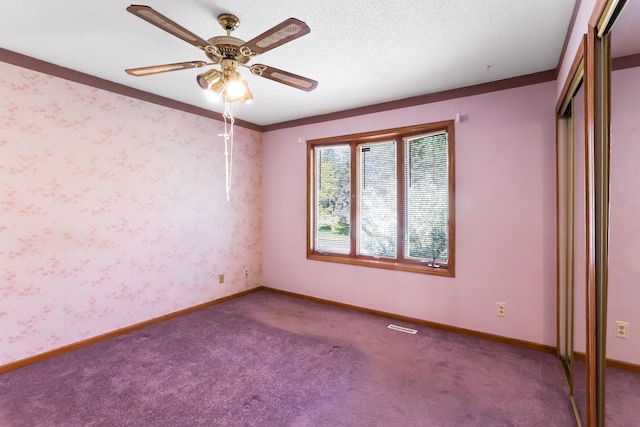 5391 Cottage Ave, White Bear Twp, MN 55110 - carpeted empty room featuring a ceiling fan and baseboards