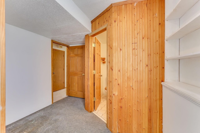 5391 Cottage Ave, White Bear Twp, MN 55110 - corridor featuring carpet flooring and a textured ceiling