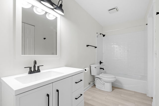9018 Neill Lake Rd, Eden Prairie, MN 55347 - full bath featuring toilet, vanity, and washtub / shower combination