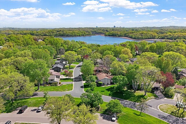 9018 Neill Lake Rd, Eden Prairie, MN 55347 - drone / aerial view of a nearby body of water and a heavily wooded area