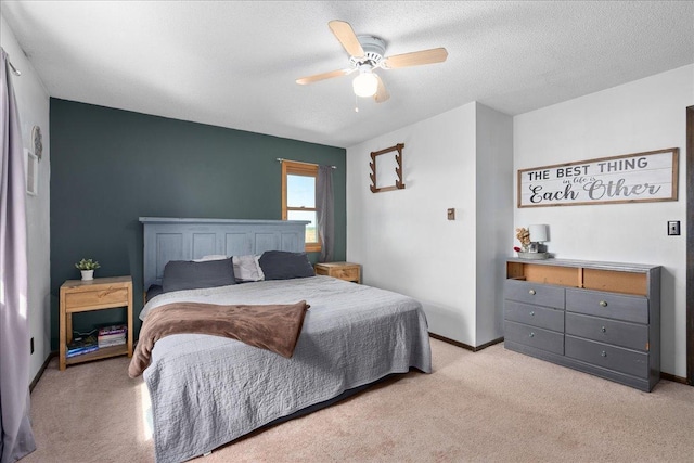 E7065 County Road B, Tainter Twp, WI 54730 - bedroom with light carpet, ceiling fan, a textured ceiling, and baseboards