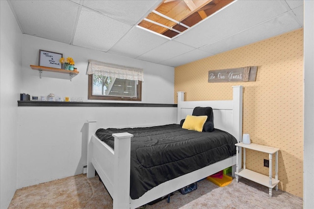 E7065 County Road B, Tainter Twp, WI 54730 - bedroom featuring carpet flooring, a drop ceiling, and wallpapered walls