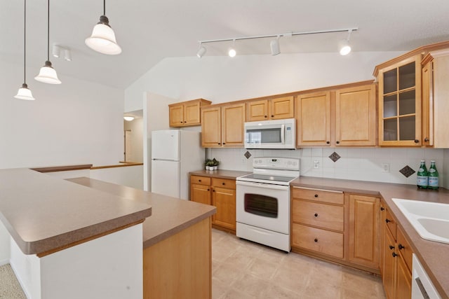 574 Marsh Dr, Delano, MN 55328 - kitchen with white appliances, decorative backsplash, vaulted ceiling, rail lighting, and glass insert cabinets