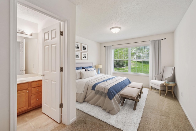 574 Marsh Dr, Delano, MN 55328 - bedroom with a textured ceiling, light colored carpet, and baseboards