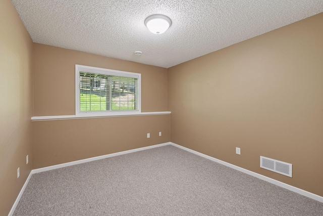 574 Marsh Dr, Delano, MN 55328 - carpeted spare room featuring a textured ceiling and baseboards
