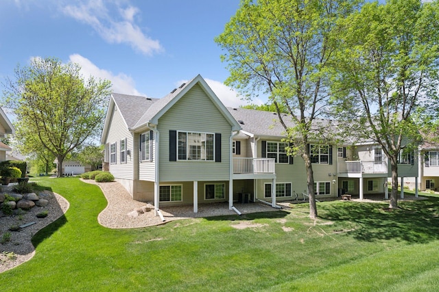 574 Marsh Dr, Delano, MN 55328 - rear view of property with a yard, central AC unit, and roof with shingles