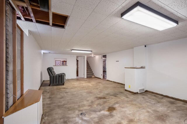 finished below grade area featuring stairs