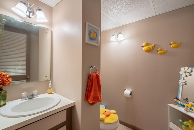 half bathroom with toilet and vanity