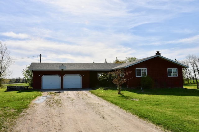 17976 120th Ave NE, North Twp, MN 56701 - ranch-style house featuring dirt driveway, a front lawn, and a garage
