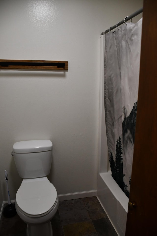 17976 120th Ave NE, North Twp, MN 56701 - bathroom featuring baseboards, toilet, and shower / tub combo with curtain