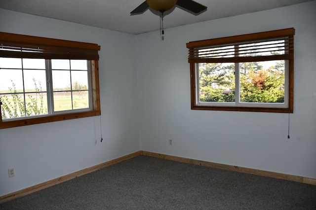 17976 120th Ave NE, North Twp, MN 56701 - carpeted empty room featuring a ceiling fan and baseboards