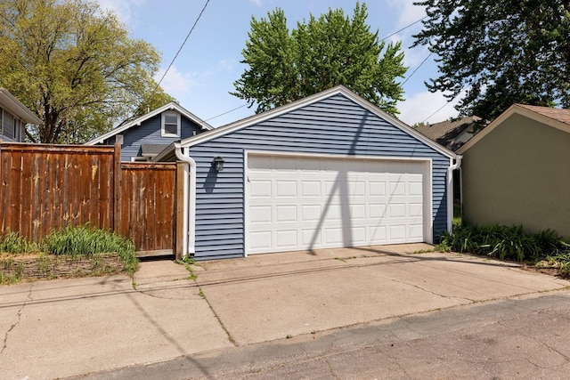 detached garage with fence