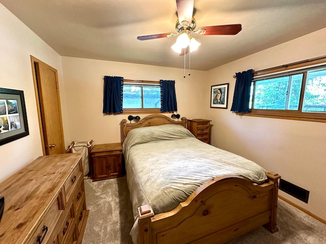 bedroom with carpet flooring and ceiling fan