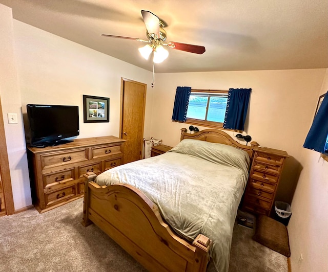 carpeted bedroom featuring a ceiling fan