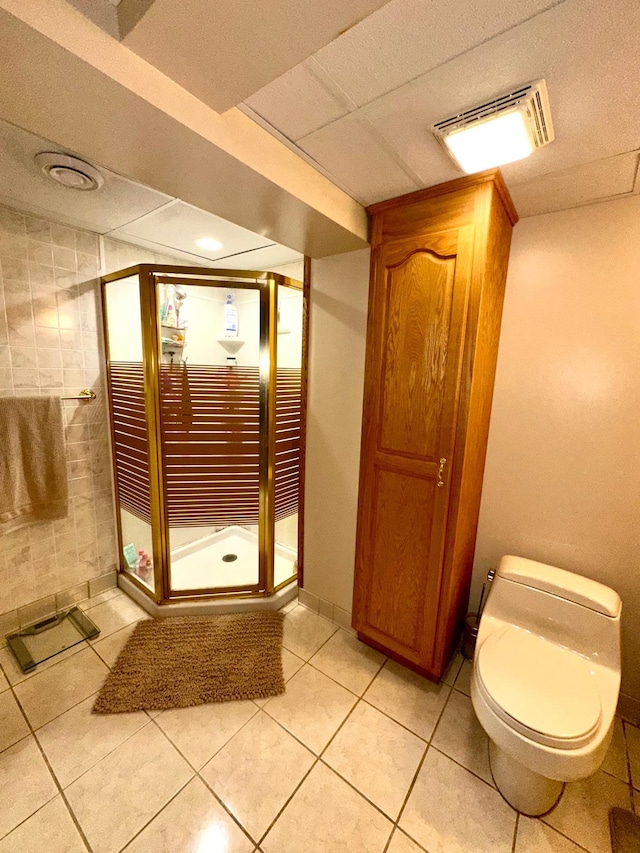 bathroom with tile patterned flooring and toilet