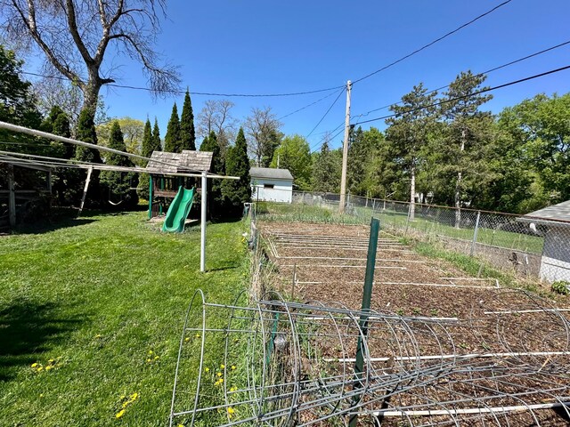 2127 S Ave E, North Saint Paul, MN 55109 - view of yard featuring a playground